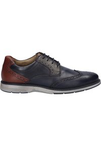 Leder-Halbschuh mit navyblauem Obermaterial, braunen Akzenten, Broguedetails und einer Gummisohle. Mit abgerundetem Zehenbereich und Schnürdesign.