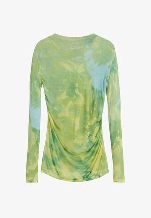 Chemise à manches longues en vert clair avec un motif tie-dye bleu et jaune. Tissu doux et extensible avec un détail froncé sur les côtés.