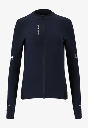 Veste de cyclisme bleue marine à manches longues, avec une fermeture éclair frontale intégrale et des accents réfléchissants. Fabriquée en tissu évacuant l'humidité, avec des coutures ergonomiques.