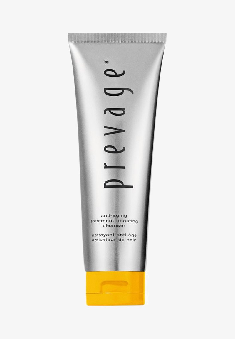 Tubo plateado con tapa amarilla, con texto en negro que dice "Prevage" y detalles del producto para un limpiador anti-envejecimiento en inglés y francés.