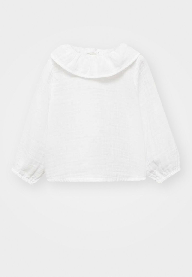 Blusa bianca a maniche lunghe realizzata in tessuto testurizzato, con scollatura arricciata e polsini raccolti, dal design cropped.