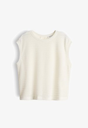 Mouwloze witte top van gestructureerde gebreide stof met ronde halslijn en losse pasvorm, afgebeeld tegen een witte achtergrond.