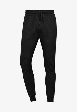Černé slim-fit tepláky vyrobené z měkké tkaniny, s elastickým pasem a šňůrkou, a užšími nohavicemi pro štíhlý vzhled.