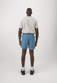 ICANIWILL ENDURANCE SHORTS MEN - Sports shorts - light teal