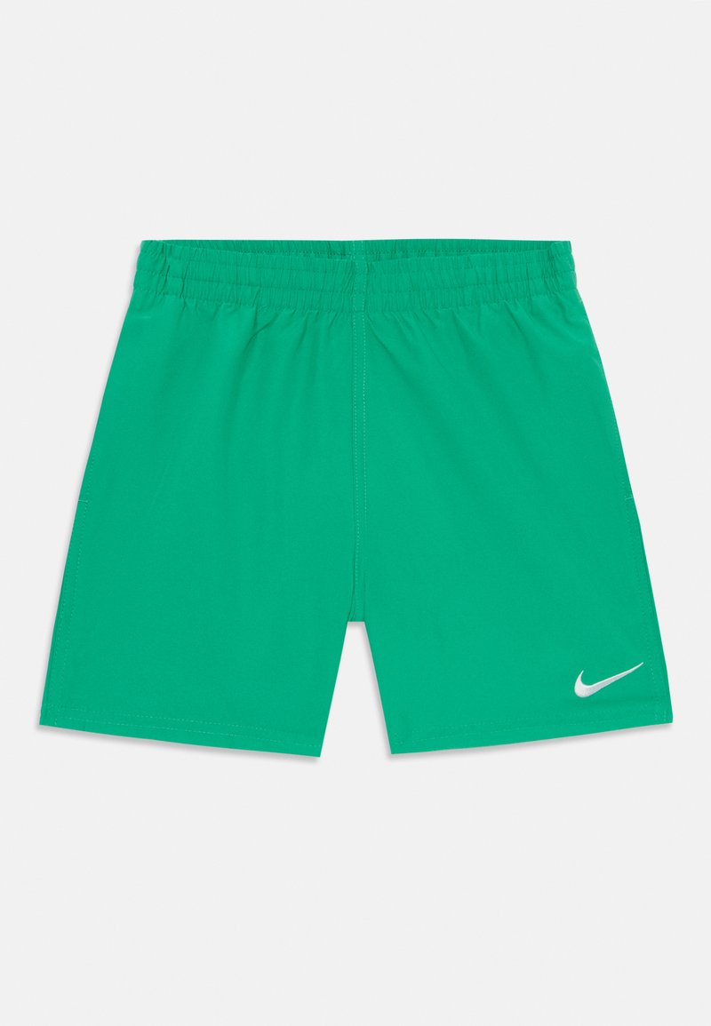 Pantaloni sportivi verdi con vita elastica, realizzati in un tessuto leggero. Presentano il logo Nike bianco sulla parte inferiore della gamba destra.