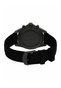 Orologio cronografo nero con cinturino in silicone nero testurizzato. Presenta due pulsanti laterali e un accento verde sulla corona. Cassa nera opaca.
