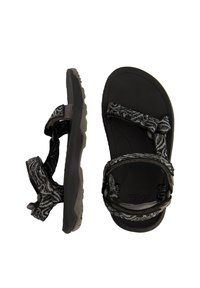 Black sandals with patterned straps, adjustable closures, and a textured rubber sole. Features a contoured footbed for support.