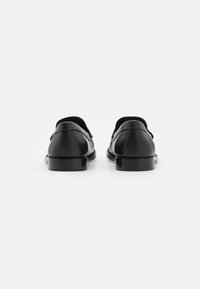 COACH JOLENE LOAFER - Jalga libistatavad jalanõud - black/optic white