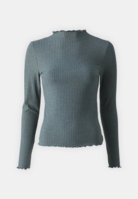 Ribbad långärmad topp i mörk teal med en åtsittande silhuett och scalloped detaljer vid halsringning och nederkant, tillverkad av ett elastiskt stickat material.