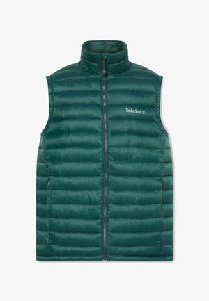 Gilet matelassé vert avec un col haut, fermeture éclair sur le devant et un design matelassé horizontal. Présente le logo Timberland sur la poitrine gauche, en matériau léger.