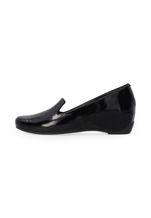Black slip-on shoe with a glossy patent finish, rounded toe, low wedge heel, and cut-out detailing on the sides. Smooth texture throughout.