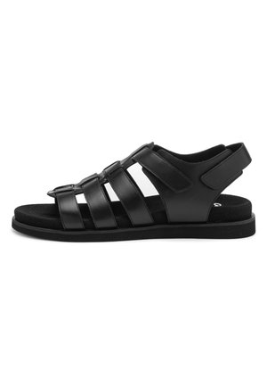 Black leather men's sandal with multiple horizontal straps, cushioned sole, and adjustable Velcro ankle strap, side view on white background.