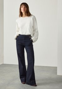 Next GOLD BUTTON FRONT WIDE  - Wide leg - denim rinse