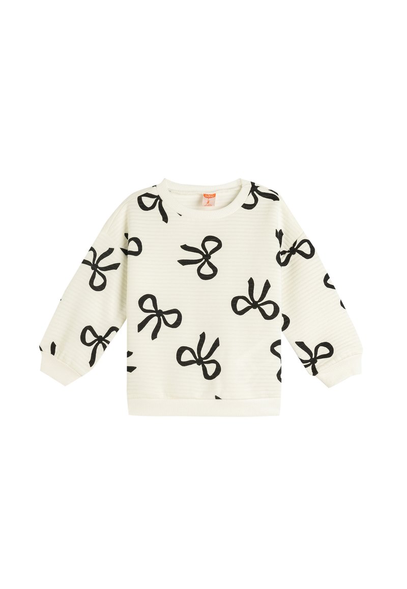 Sweatshirt blanc avec imprimé nœud noir, texture côtelée, col rond et manches longues. Dispose de poignets et d'une taille élastiques.