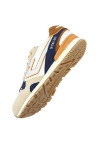 Baskets avec un dessus en suède beige et nylon blanc, des accents bleu marine et des détails orange. Elles disposent d'une semelle en caoutchouc texturé avec des rainures.