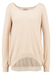 Beige stickad tröja med rundad halsringning, långa ärmar och rundad nederkant. Har ett texturerat mönster och ribbade muddars.