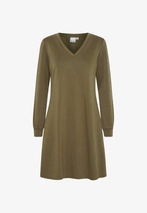 Alyvuogių žalia suknelė ilgomis rankovėmis, V formos iškirpte ir laisvu siluetu. Pagaminta iš minkštos medžiagos su lygiu paviršiumi, su kelių ilgio šonu.