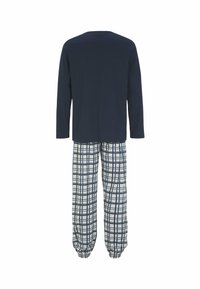 Marineblauw langemouwtop gecombineerd met geprinte broek in roomkleur en marineblauw. De broek heeft een elastische tailleband. Zacht, ademend materiaal.