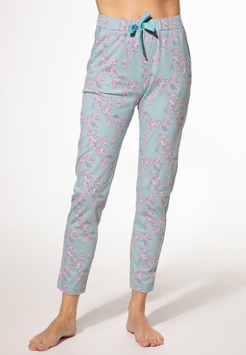 Light blue patterned pajama pants with floral designs in pink and green, featuring an elastic waistband with a front tie. Soft fabric, tapered leg.