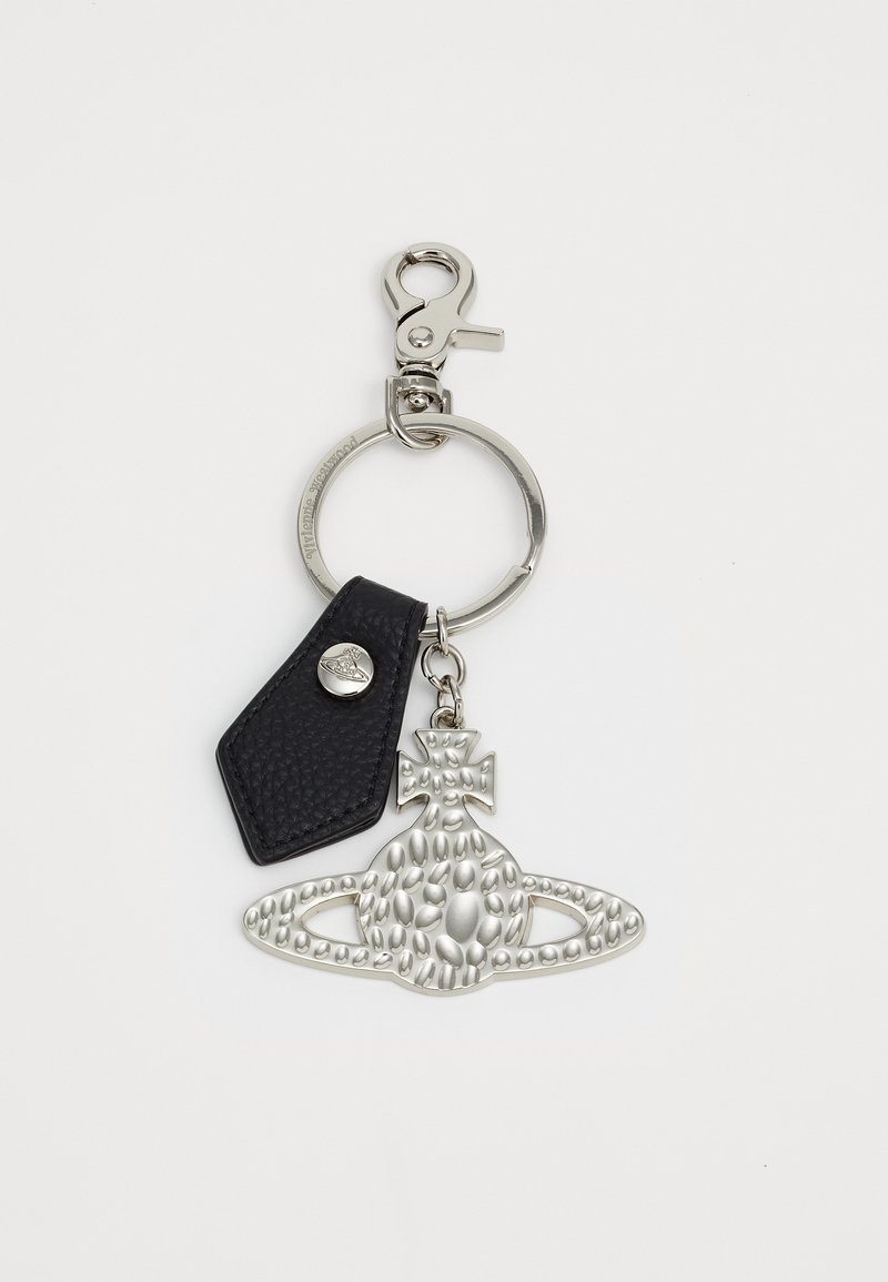 Silver keychain featuring a textured charm shaped like a planet, attached to a black leather tag with a snap button and metal clasp.