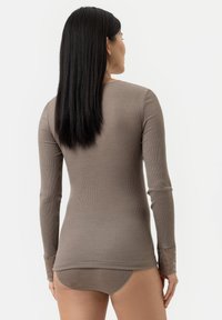 Brown ribbed long-sleeve top with lace accents at the cuffs, paired with a matching fitted brief, displayed from the back. Smooth texture.