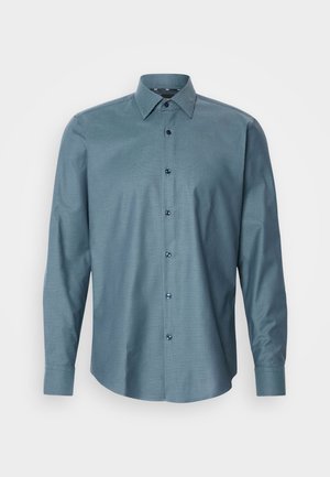 Langermet, teal knappskjorte med teksturert mønster, spiss krage og mørke knapper. Har en tradisjonell passform og buet kant.