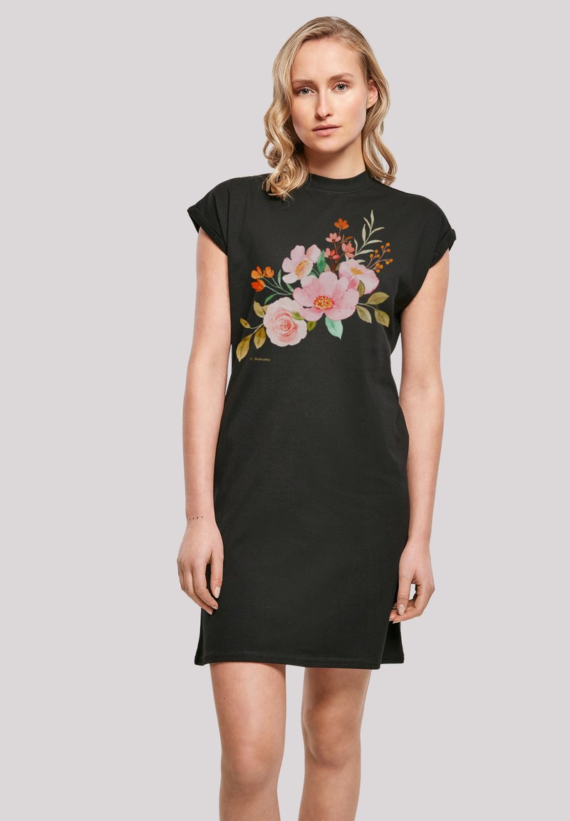 Schwarzes Baumwoll-T-Shirt-Kleid mit kurzen Ärmeln, das auf der Vorderseite mit einem bunten Blumenmuster in Pink, Orange und Grün versehen ist.