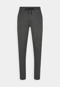 Grijze sweatpants van een gestructureerde stof, met een tailleband met trekkoord en taps toelopende pijpen, zonder zichtbare patronen of hardwaredetails.
