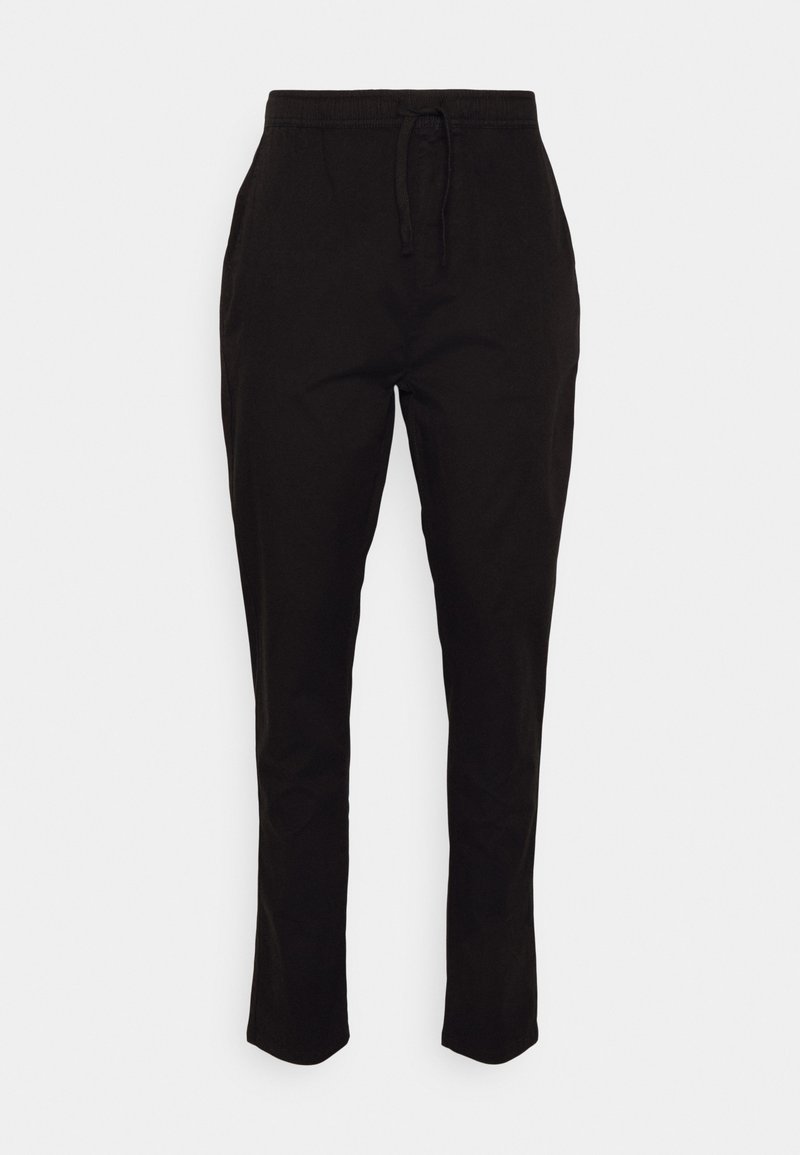 Black jogger pants with an elastic waistband and drawstring, featuring side pockets and a tapered leg design. Smooth cotton fabric.