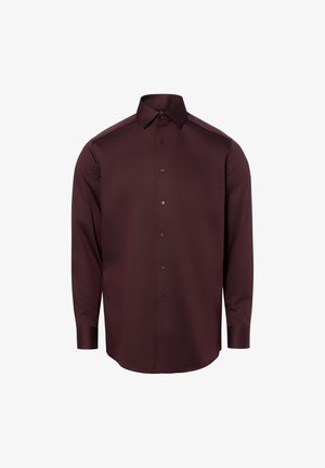 Camicia da uomo marrone scuro a maniche lunghe con chiusura con bottoni e collo appuntito su sfondo bianco.