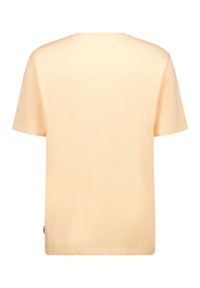 Light peach short-sleeve t-shirt made of smooth cotton, featuring a crew neck and a relaxed fit, with a straight hemline and no prominent details.