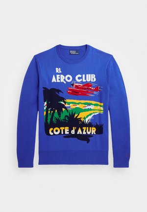 Pull bleu à manches longues avec un graphique d'un avion rouge volant au-dessus de palmiers, de champs et du littoral, texte "RL Aero Club Côte d'Azur."
