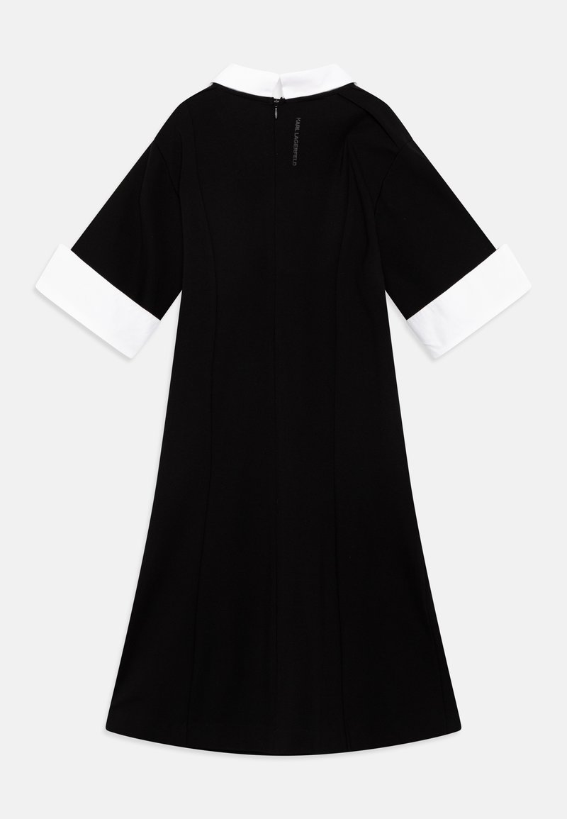 black dress with white collar and cuffs black dress with white collar SOLD Adolfo Black Knit Mod Dress With White Satin Collar & Cuffs 1970s Palm Beach Vintage