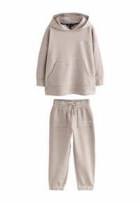 Beiges Sweatshirt- und Hosen-Set; Hoodie mit Fronttasche, elastischen Bündchen und Kordelzug am Hosenbund. Weiche Baumwollmischung, dezentes Branding.