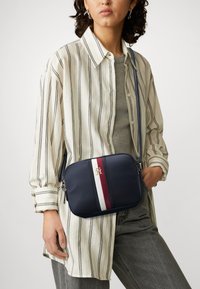 Tommy Hilfiger - POPPY CROSSOVER CORP - Cross body bag - space blue Thumbnail Image 1