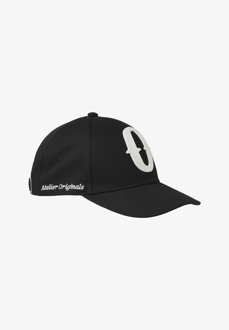 Black cap made of fabric, featuring a prominent white embroidered logo on the front. The side includes the text "Atelier Originals."