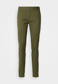 Groene katoenen chinos met een slim fit, voorzien van een knoopsluiting aan de voorkant en twee zijzakken. Gladde textuur en strak design.