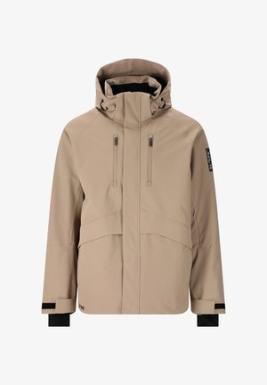 Beige waterdichte jas met een hoge kraag, verstelbare capuchon, twee met rits gesloten borstzakken en contrasterende zwarte manchetten. Gladde afwerking.