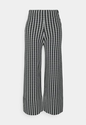 Schwarz- und graustriped, weite Strickhose mit hohem elastischen Bund, der vertikale Streifen für ein strukturiertes Erscheinungsbild aufweist.