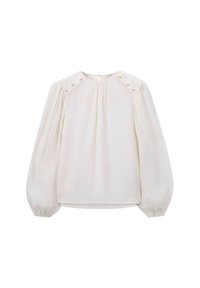 Weiße Bluse mit langen Puffärmel, gefaltetem Vorderteil, Knopfakzenten an den Schultern und Schlüsselaugenverschluss auf der Rückseite. Glatte, leichte Stoffqualität.