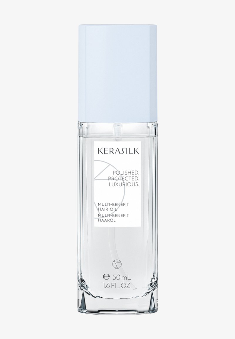 Flacon en verre transparent avec bouchon bleu clair contenant 50 mL d'huile capillaire multi-bénéfices Kerasilk étiquetée poli, protégé, luxueux.