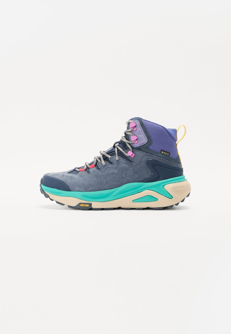 Water-resistant hiking boot featuring blue and purple textile upper, vibrant teal midsole, and Vibram outsole for traction.