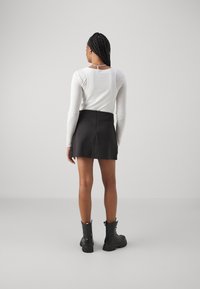 Puma Áčková sukně - black