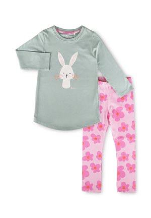 Long-sleeve light green shirt with a white bunny face and pink leggings with large pink flowers and orange centers.