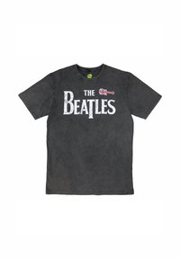 Black cotton T-shirt featuring "THE BEATLES" printed in white with a guitar and Union Jack accent on the chest. Short sleeves, crew neck.
