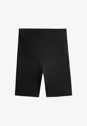 Shorts de bain noirs en tissu lisse, dotés d'une taille haute avec des détails de couture géométriques et d'une silhouette ajustée.