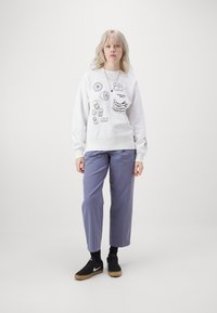 Carhartt WIP CARA PANT - Hlače - bay blue