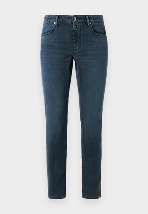 Jeans bleu foncé à coupe slim, design à cinq poches et fermeture à bouton. Fabriqués en denim avec une texture lisse et un léger délavage.