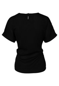 Svart kortärmad blus med rund halsringning och en liten nyckelhålsdetalj i ryggen. Tillverkad av mjukt, slät tyg med en figurnära silhuett.