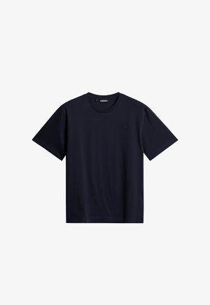 T-shirt en coton bleu marine avec un col rond, des manches courtes et un logo embossé discret sur la poitrine. Texture lisse et coupe régulière.